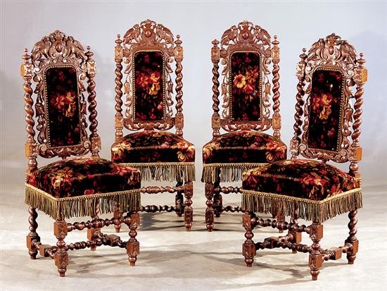 Appraisal: Four Jacobean style carved walnut side chairs early th centurypierce-carved