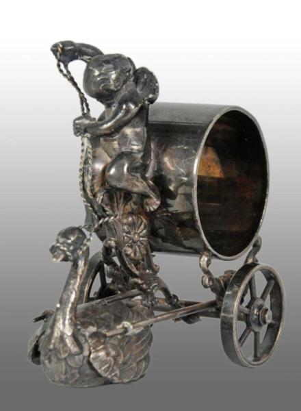 Appraisal: Winged Cherub on Wheeled Figural Napkin Ring Description Marked Meriden