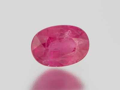 Appraisal: An Unmounted Ruby Carat Oval faceted cut weighting approx ct