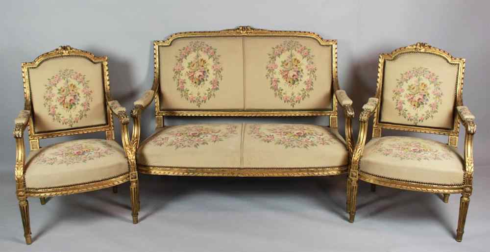 Appraisal: LOUIS XVI STYLE GILTWOOD CANAPE WITH TWO ARMCHAIRS ENSUITE the