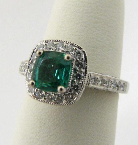 Appraisal: k white gold emerald and diamond ring containing approximately ctw