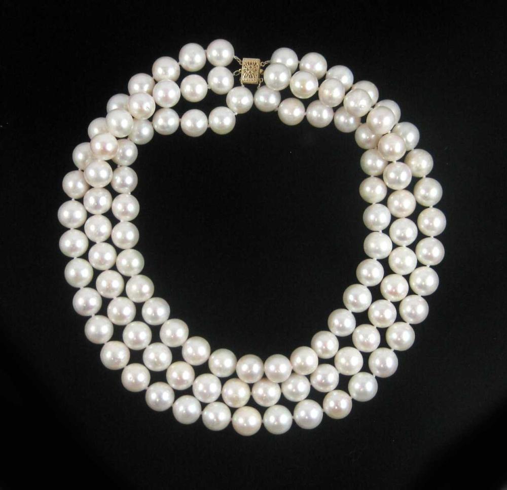 Appraisal: TRIPLE STRAND SOUTH SEA PEARL NECKLACE with three graduated strands