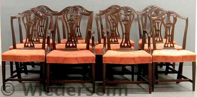 Appraisal: Set of twelve Chippendale style mahogany dining room chairs with