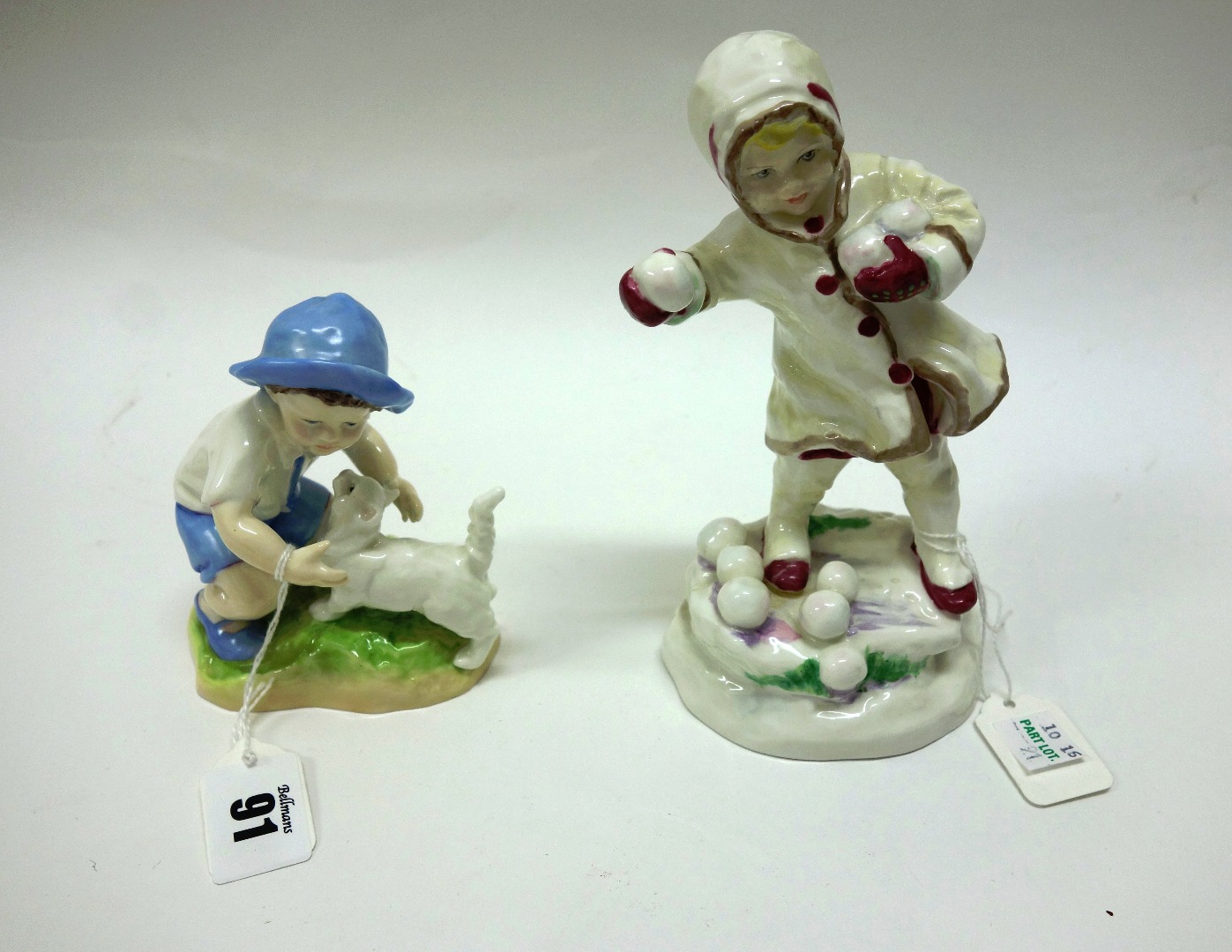 Appraisal: Two Royal Worcester porcelain figures 'September' and 'December'