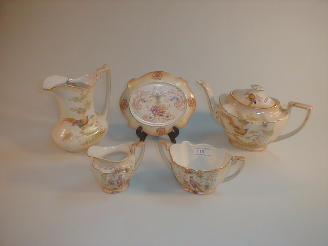 Appraisal: A Crown Ducal Avis pattern tea set comprising tea pot