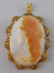 Appraisal: A yellow metal tests carat gold framed cameo brooch approx