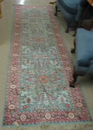 Appraisal: ORIENTAL FAUX SILK RUNNER Indo-Persian overall floral design on aqua