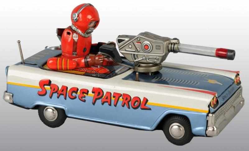 Appraisal: Tin Space Patrol Battery-Operated Toy Description Japanese Working Marked Space