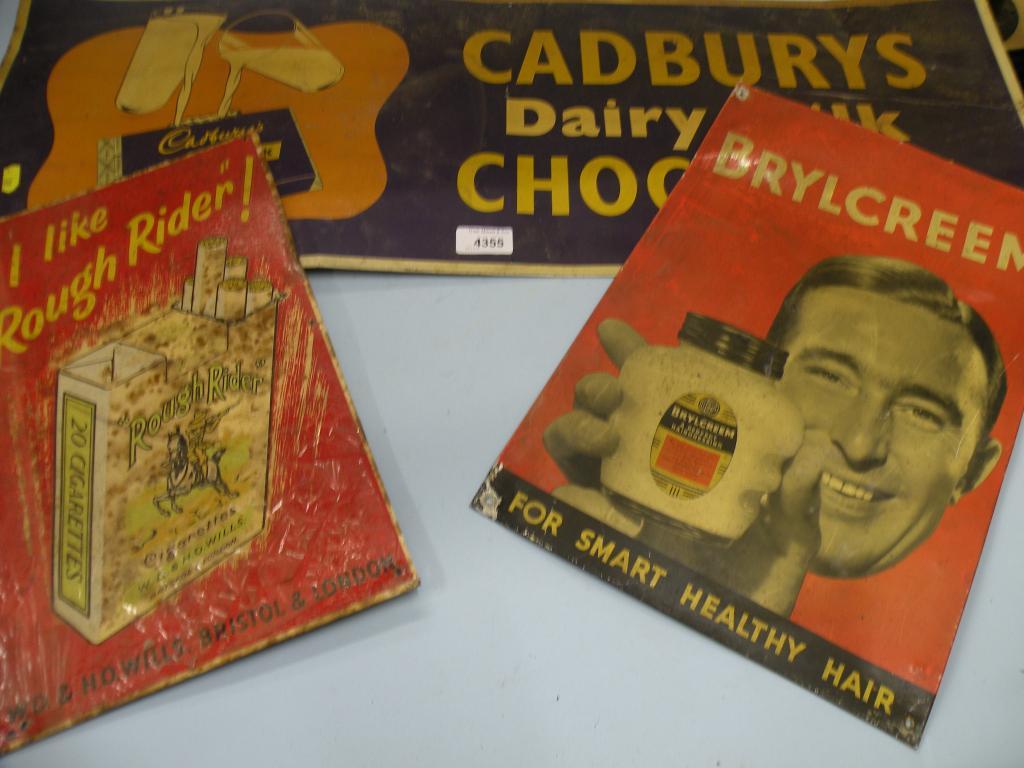 Appraisal: A Cadbury's Dairy Milk tin plate advertising sign and another