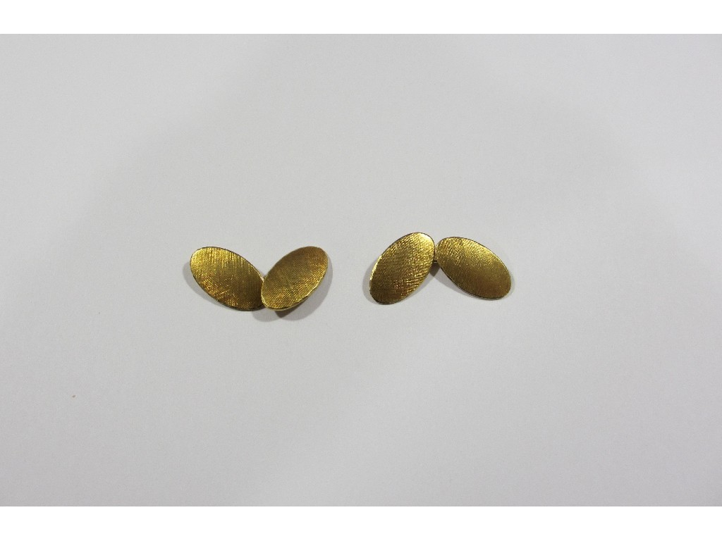 Appraisal: Pair of ct gold oval cuff links with textured finish