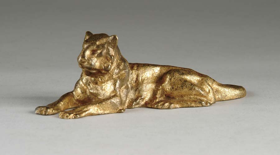 Appraisal: TIFFANY LIONESS PAPERWEIGHT Gold dore highlights this well detailed lioness