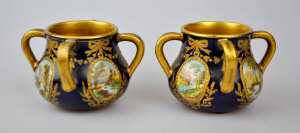 Appraisal: A pair of Copeland th century miniature four handle vases