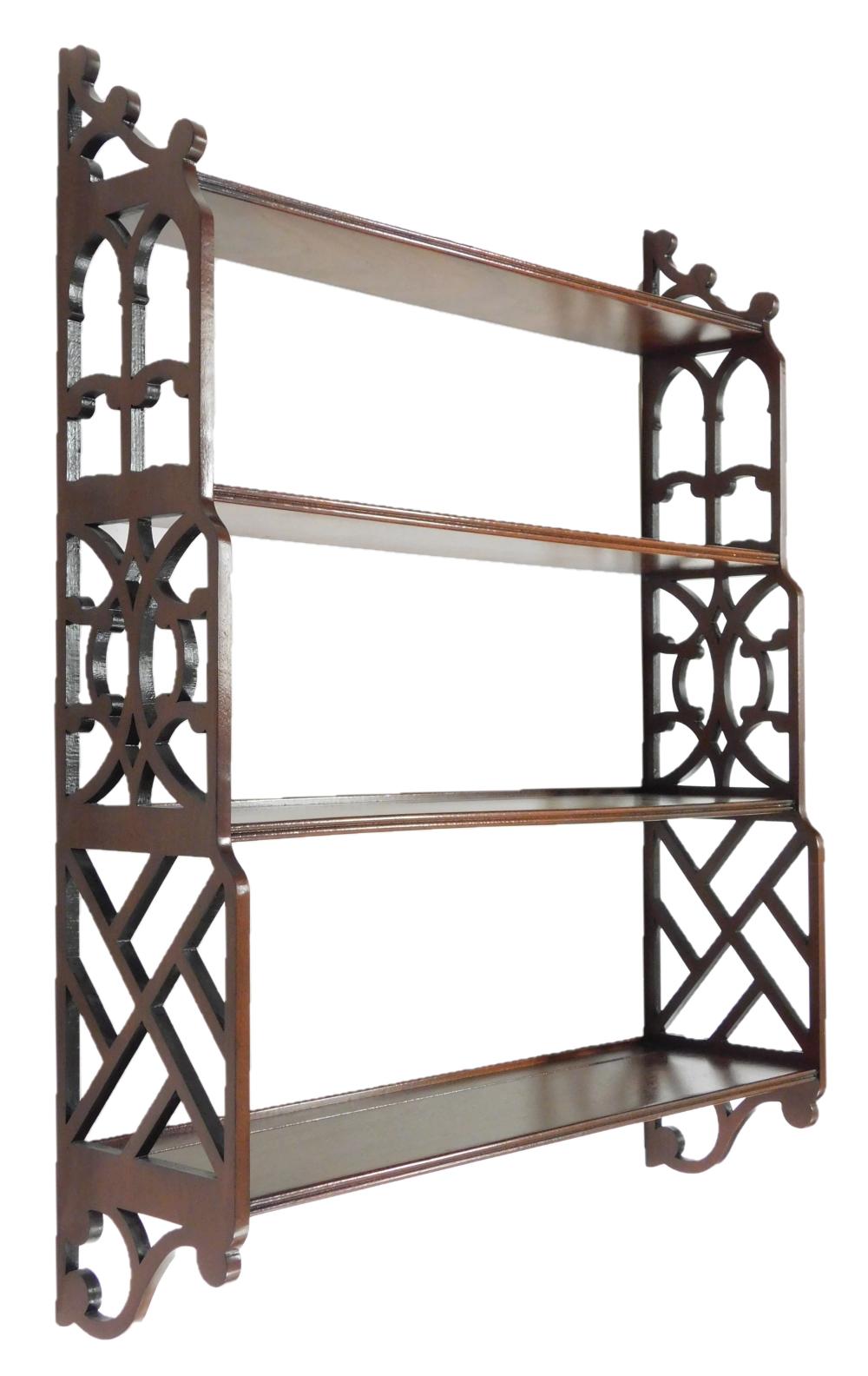 Appraisal: Chippendale style hanging wall shelf with pierced fretwork sides mahogany