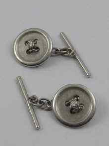 Appraisal: A pair of white metal tests platinum diamond set cufflinks