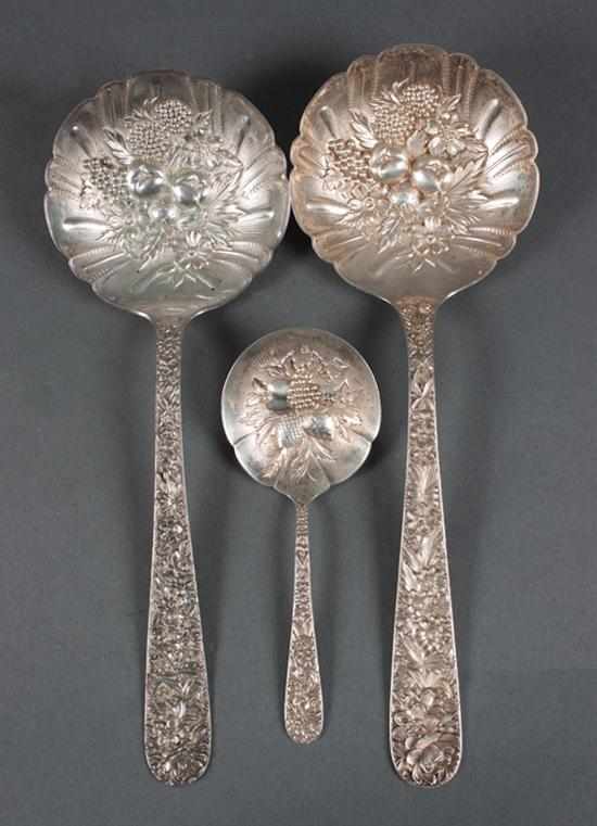 Appraisal: Three American repousse sterling silver berry spoons Kirk Baltimore comprising