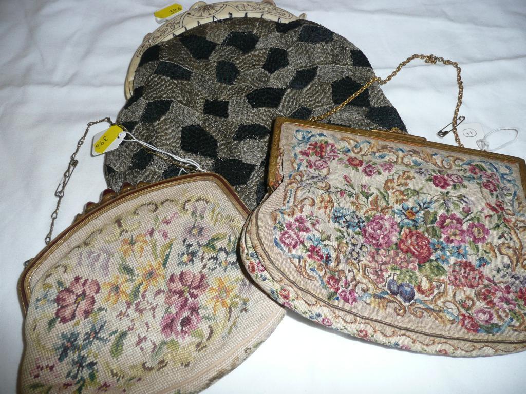 Appraisal: Two vintage tapestry purses with decorative clasps and chain handles