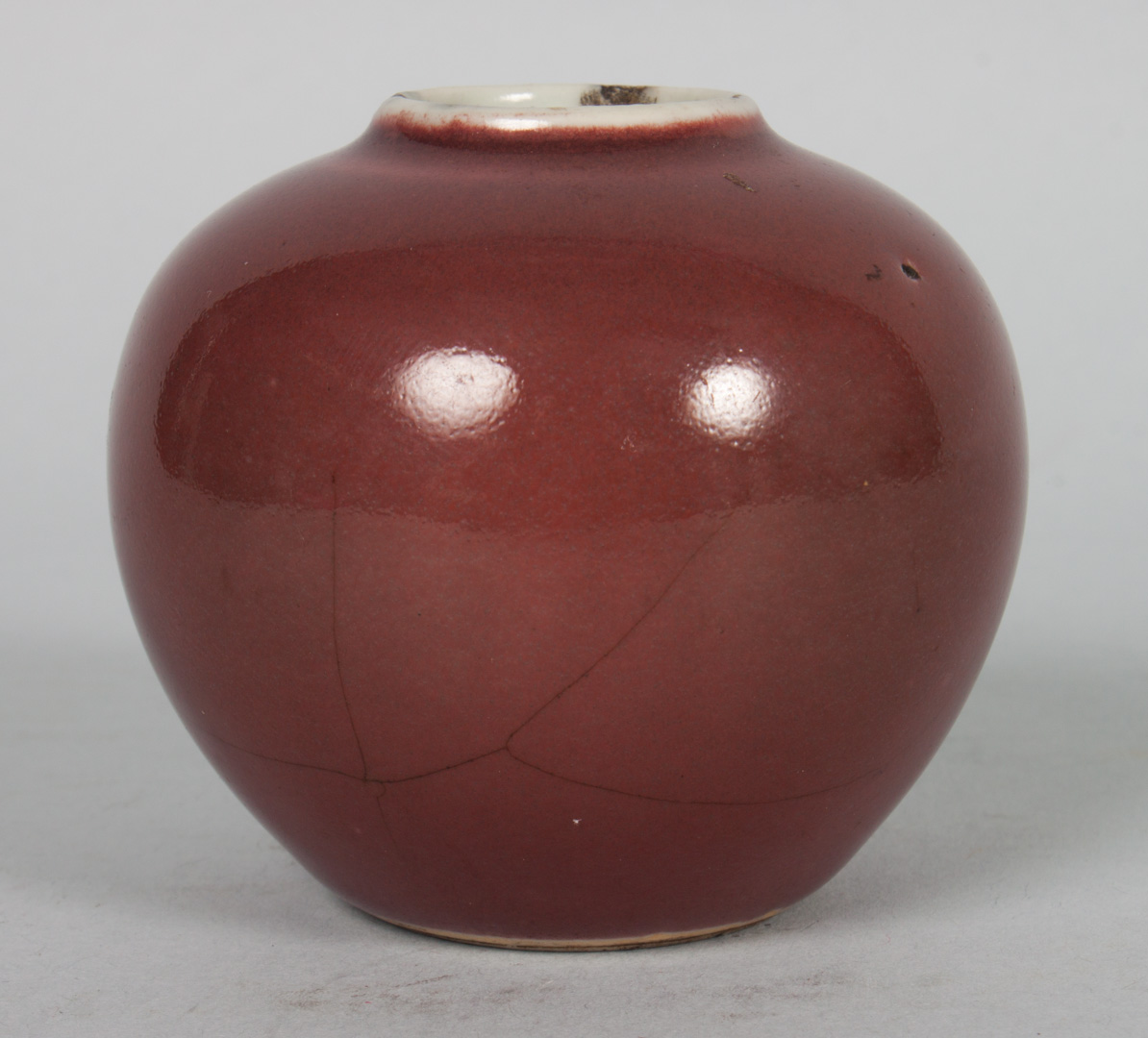 Appraisal: Chinese monochrome porcelain miniature vase th century peach bloom glaze