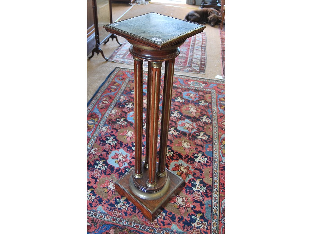 Appraisal: A th century French Empire-style mahogany and brass mounted torchere