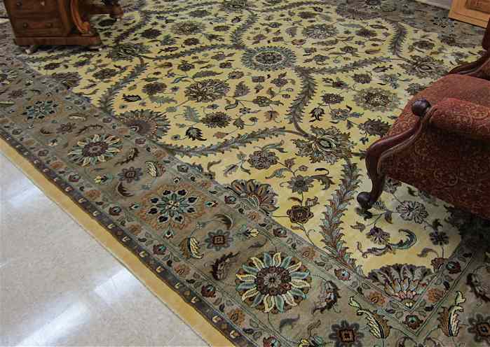 Appraisal: FINE HAND KNOTTED ORIENTAL CARPET Persian Isfahan design of floral