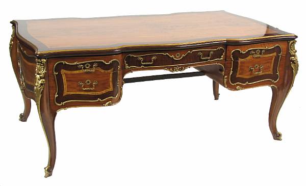 Appraisal: A Louis XV style gilt bronze mounted walnut bureau plat