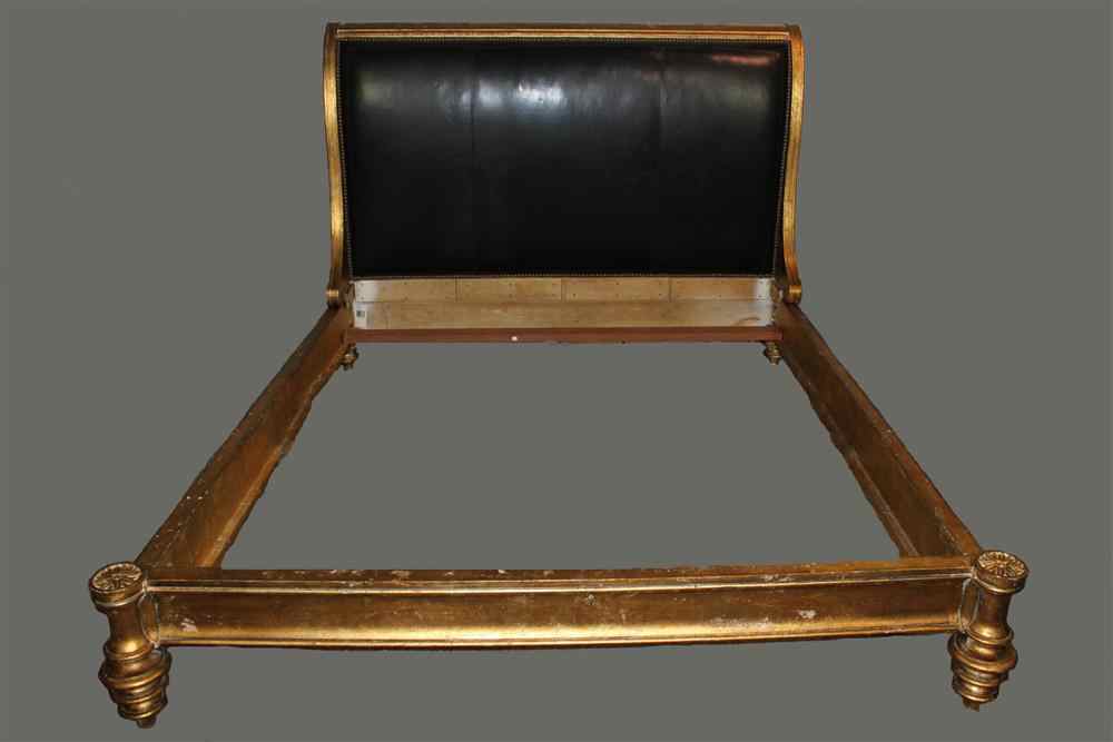 Appraisal: LOUIS XVI STYLE GILDED AND LEATHER BEDSTEAD The rectangular backscrolling