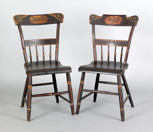 Appraisal: Two Pennsylvania painted plank bottom half spindle chairs ca each