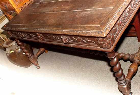 Appraisal: Victorian carved oak two-drawer library table late th century Estimate