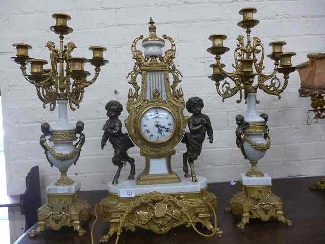 Appraisal: A LOUIS XVI STYLE GARNITURE DE CHEMINEE the central mantle