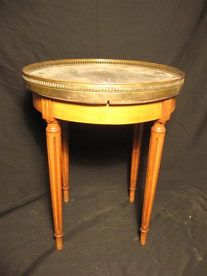 Appraisal: Directoire style low table th century Piered brass gallery and