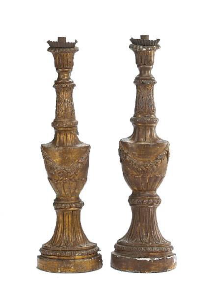 Appraisal: Each swagged urn supporting leaf carved standard and platform with