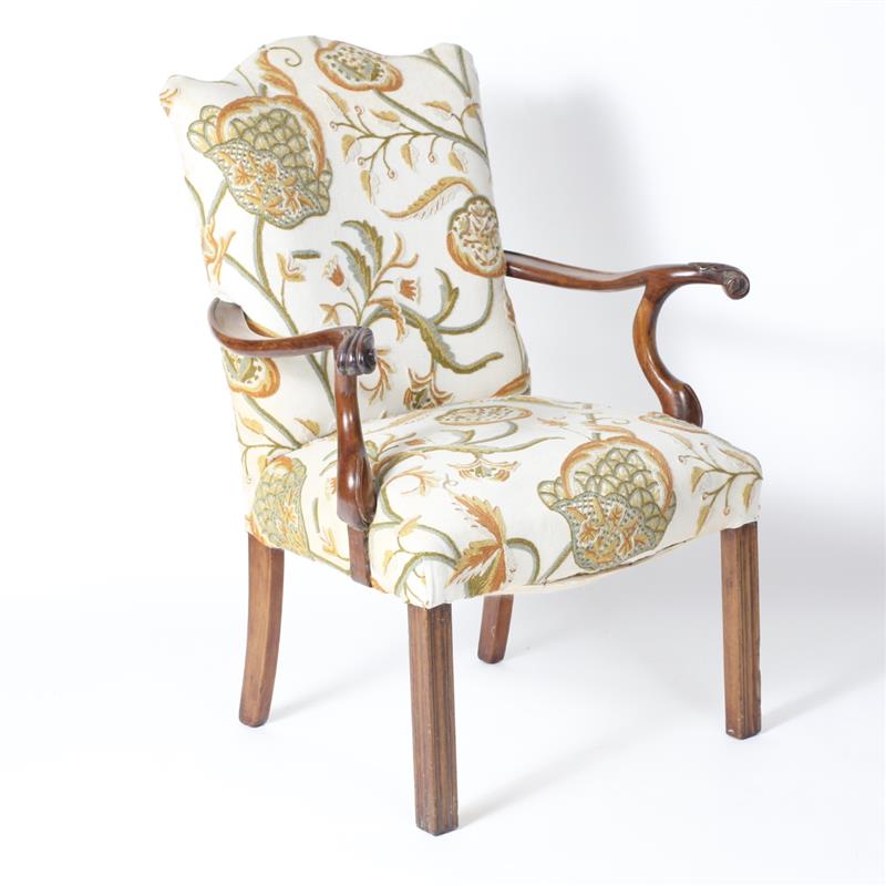 Appraisal: Antique carved walnut arm chair with crewel stitch floral upholstery