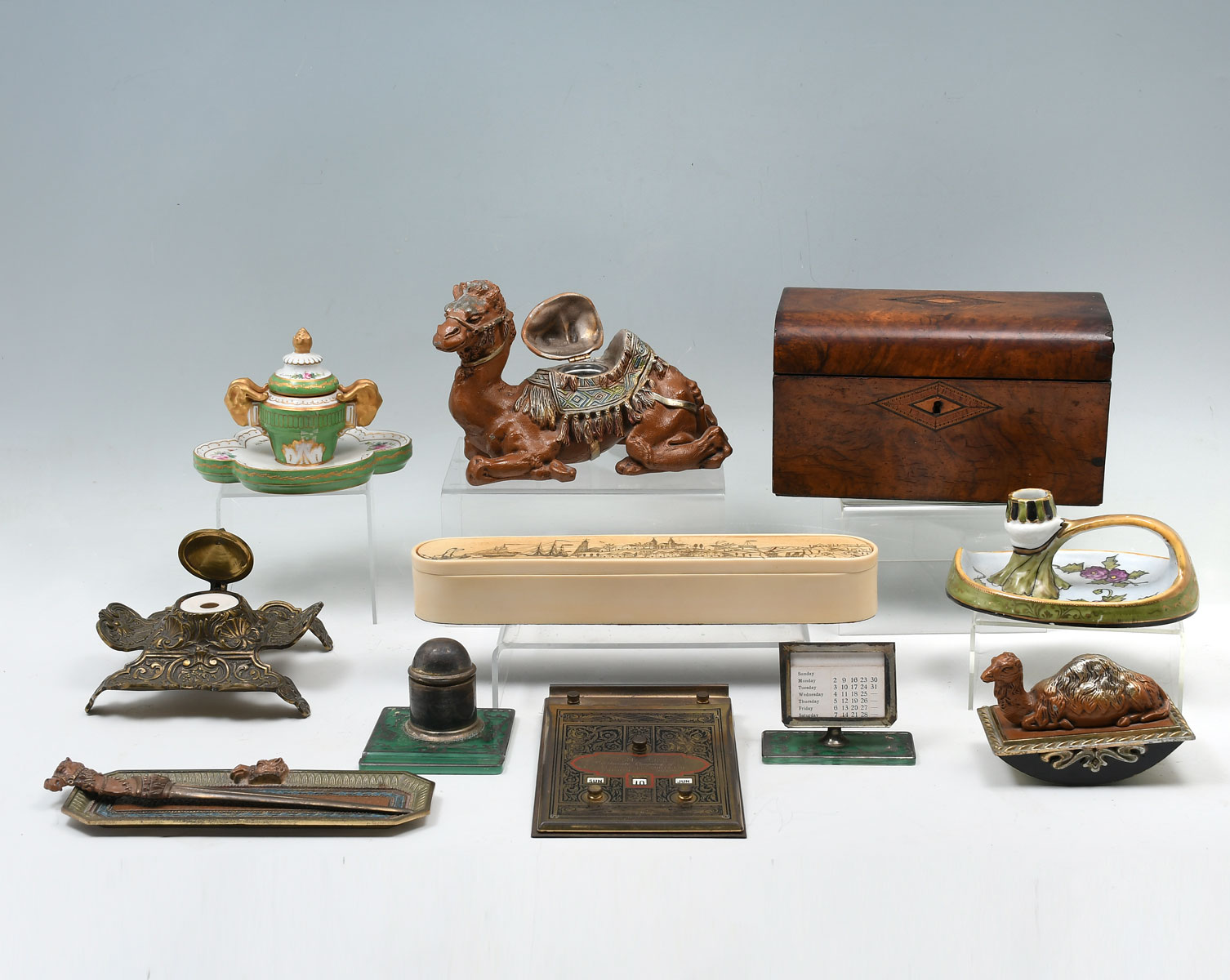 Appraisal: PC INKWELL DESK SET COLLECTION Comprising pc Camel motif desk