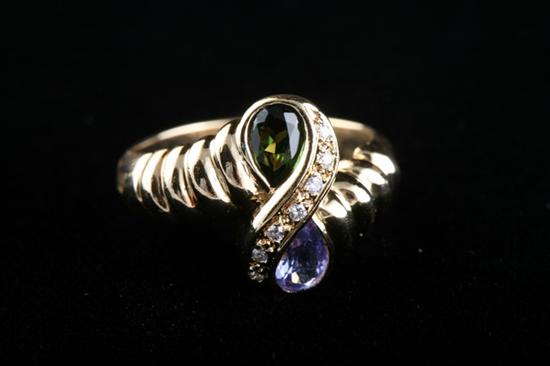 Appraisal: K YELLOW GOLD TANZANITE CHROME DIOPSIDE AND DIAMOND RING Ribbed