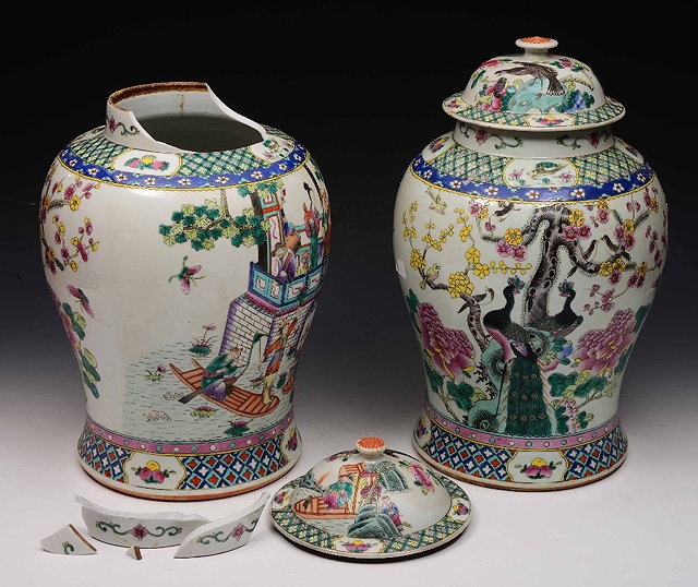 Appraisal: A pair of Chinese baluster vases and coverseach decorated in