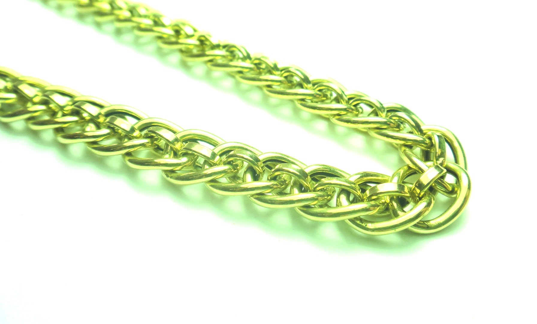 Appraisal: A ct gold neckchain in an interwoven curb and oval