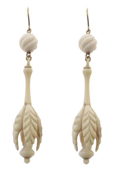 Appraisal: A PAIR OF IVORY EARRINGS the drop earrings of foliate