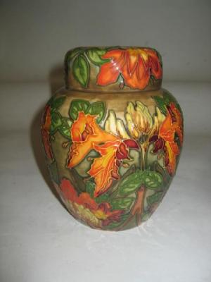 Appraisal: A MOORCROFT POTTERY VASE of tall waisted form tube lined