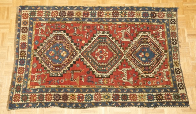 Appraisal: Antique Caucasian Carpet with Animals Geometric and floral some wear