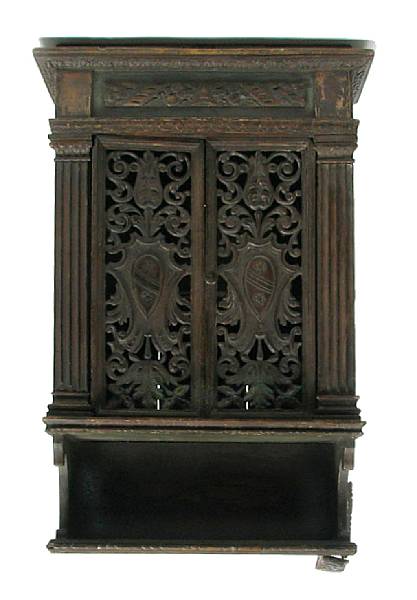 Appraisal: A Continental carved and paint decorated two door cabinet height