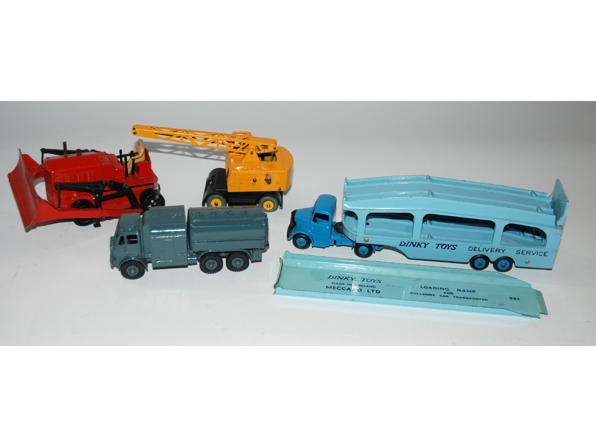 Appraisal: A Dinky Pullmore Car Transporter a Dinky Blaw Knox Bulldozer