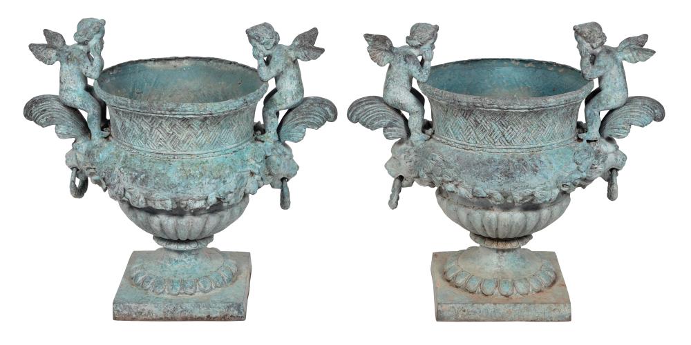 Appraisal: PAIR OF CAST IRON GARDEN URNS SECOND HALF OF THE