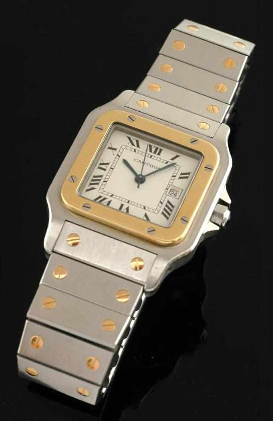 Appraisal: A Cartier Santos wristwatch Automatic movement square off white dial