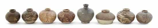 Appraisal: Chinese brown-glazed diminutive jars Song to Ming Dynasty narrow rim