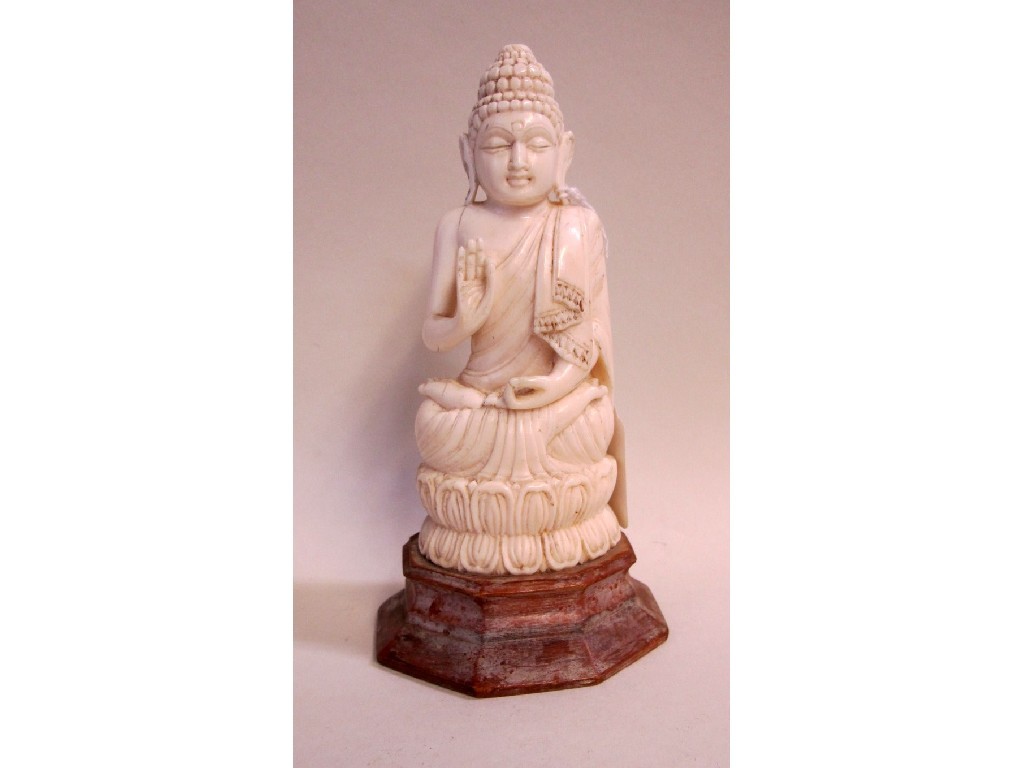 Appraisal: Carved ivory Buddha figure