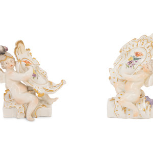 Appraisal: A Pair of Meissen Porcelain Figures of Putti with Cartouches