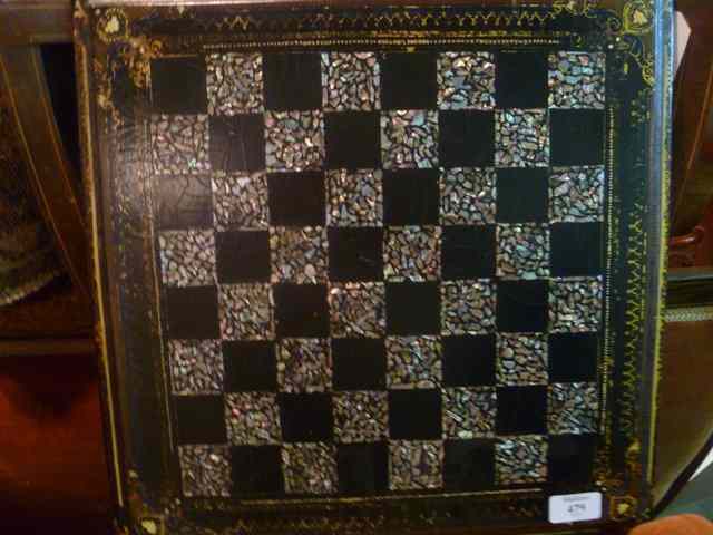 Appraisal: A VICTORIAN PAPIER MACHE SQUARE CHESS BOARD with mother of