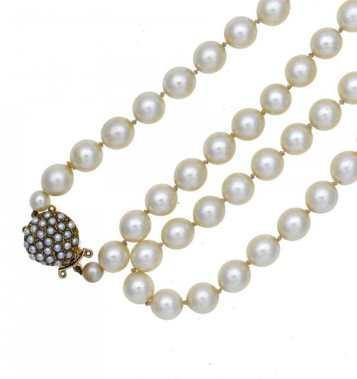 Appraisal: A CULTURED PEARL NECKLACE of sixty three approx mm and