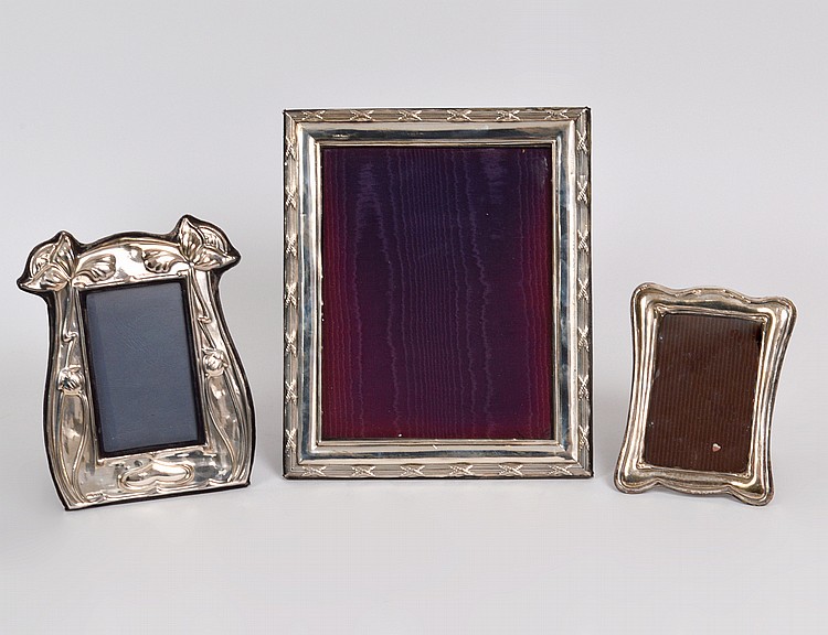 Appraisal: THREE STERLING SILVER PICTURE FRAMES th Century all marked Comprising