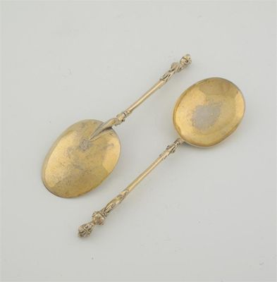 Appraisal: A pair of late th century silvergilt spoons with cast