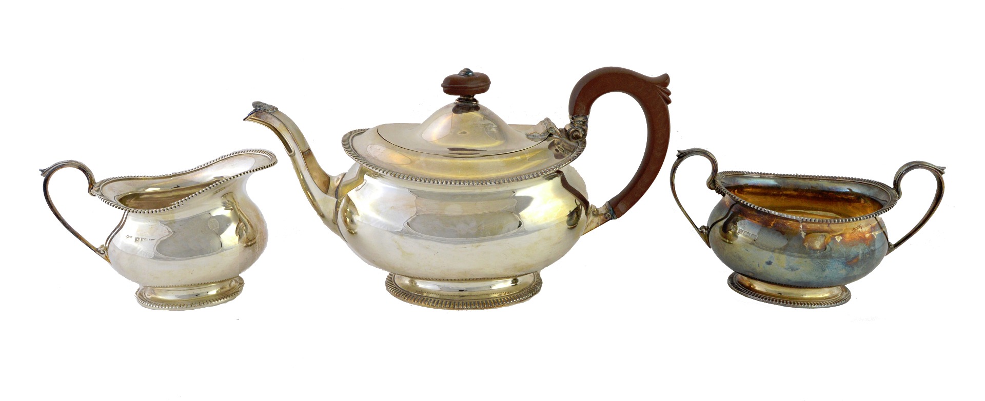 Appraisal: A silver three piece tea set comprising a teapot a